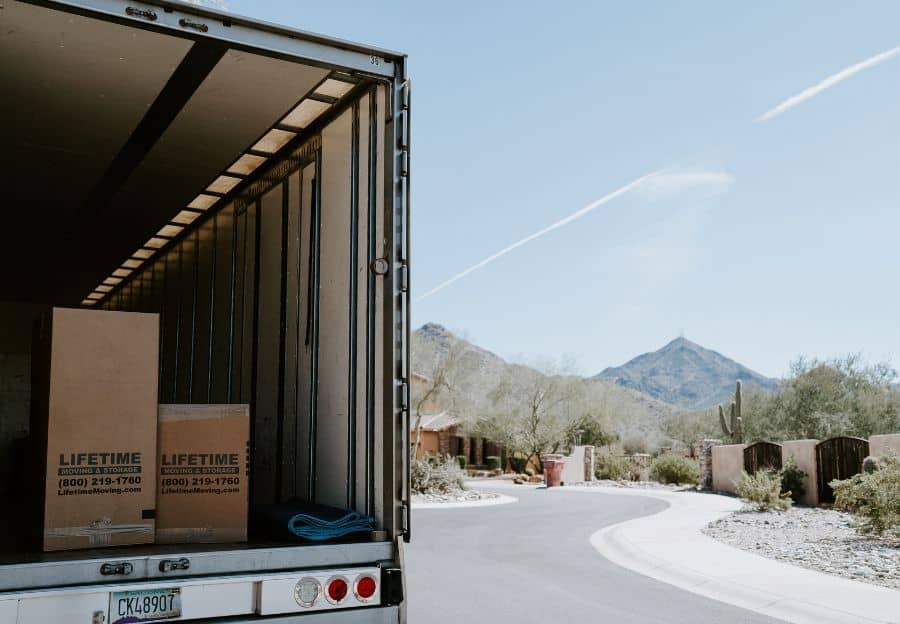 Lifetime Moving & Storage mover loading a long distance moving truck