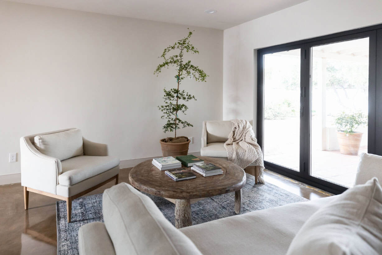 Staged bedroom with indoor plant and minimal decor prepared for a home listing